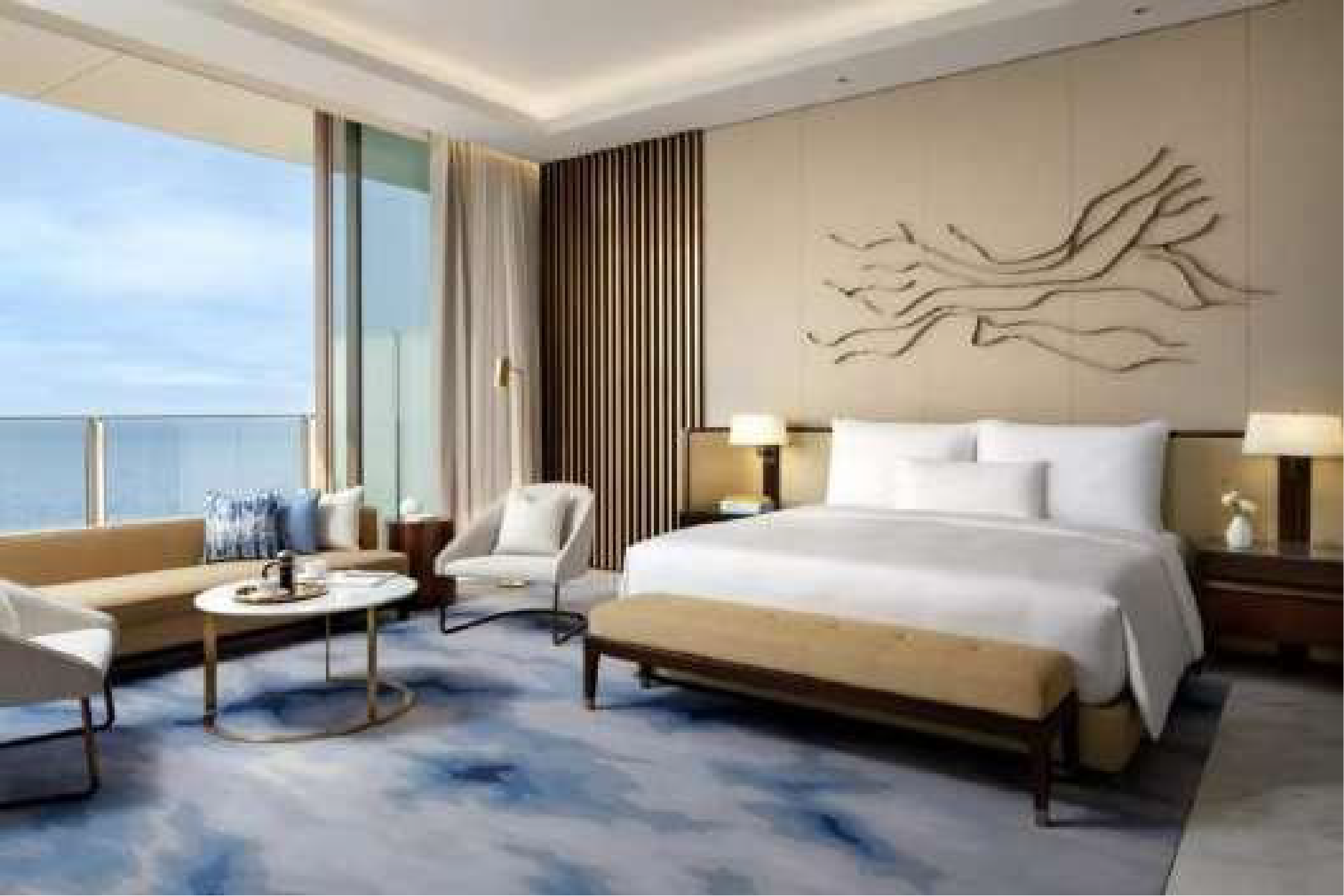 Hotel bedroom suite with sea view